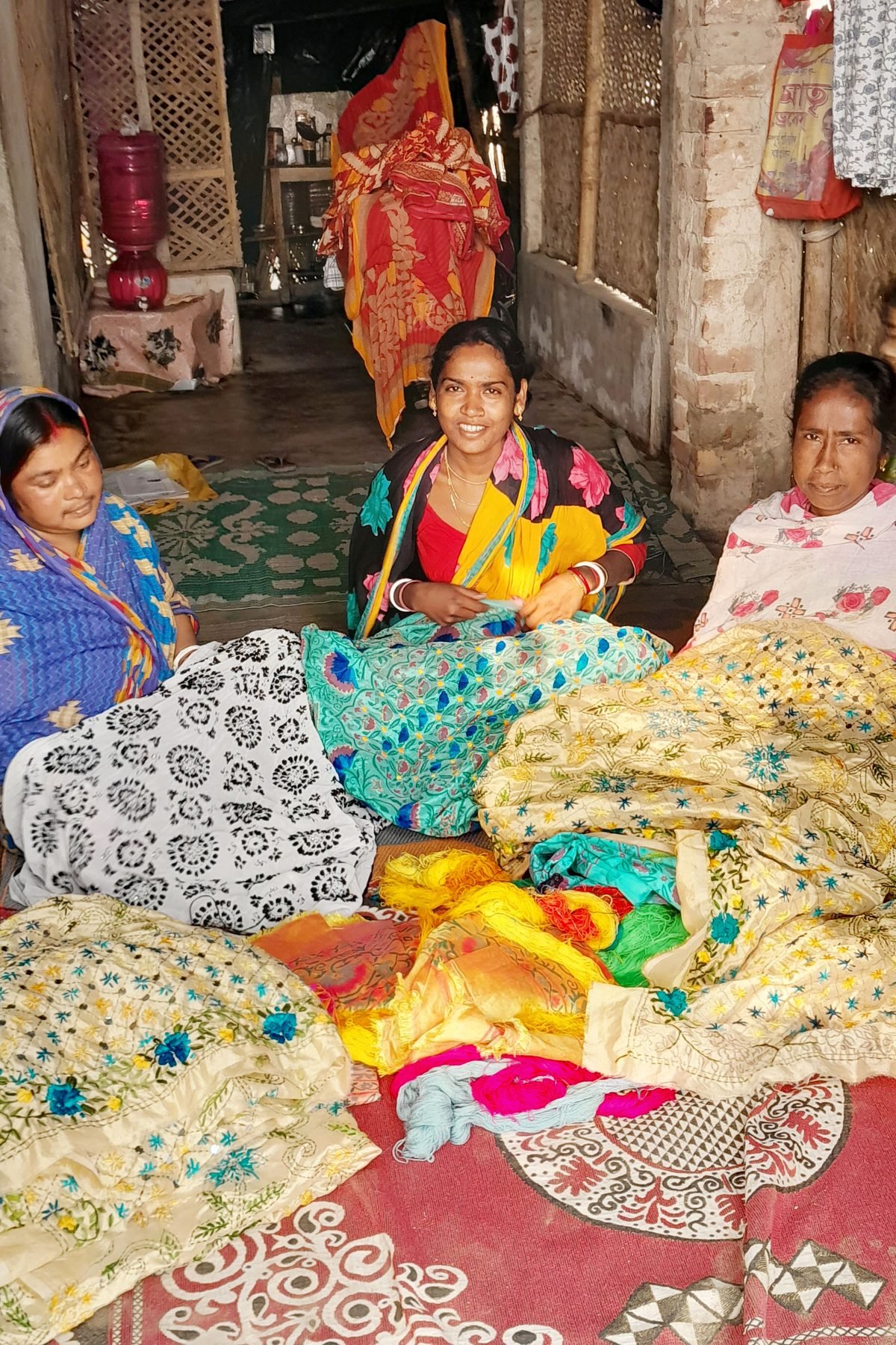 Self Help Group members with their finished handicrafts